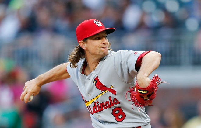 St. Louis Cardinals starting pitcher Mike Leake (8) works against the Atlanta Braves in the first inning of a baseball game Saturday, May 6, 2017, in Atlanta. (AP Photo/John Bazemore)