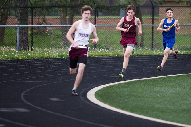 RYAN MICHALESKO/JOURNAL STAR FILE PHOTO

Runners round the corner during a track meet at Dunlap on April 21, 2017.