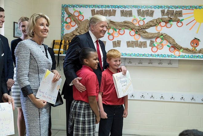 President Donald Trump and Secretary of Education Betsy DeVos visited Saint Andrew Catholic School in Orlando on March 3, 2017. [Official White House Photo by Shealah Craighead] see story for link