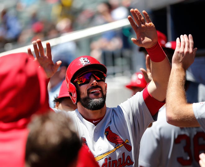 St. Louis Cardinals first baseman Matt Carpenter celebrates after hitting a home run in the first inning of a baseball game against the Atlanta Braves, Sunday, May 7, 2017, in Atlanta. (AP Photo/John Bazemore)
