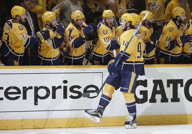 Nashville Predators center Ryan Johansen (92) celebrates after scoring against the St. Louis Blues during the third period in Game 6 of a second-round NHL playoff series on Sunday. [AP Photo/Mark Humphrey]
