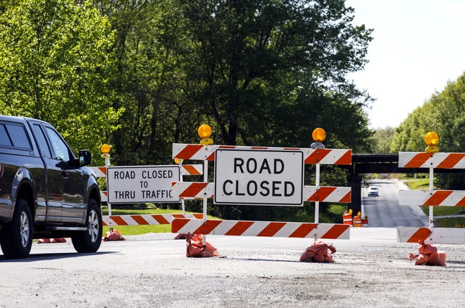 Signs that say Emmerson Airline Road is closed between Girard and Palmyra are ignored by most motorists. Road work in the area has been underway for three years. The signs were photographed May 2, 2017. [Rich Saal/The State Journal-Register]