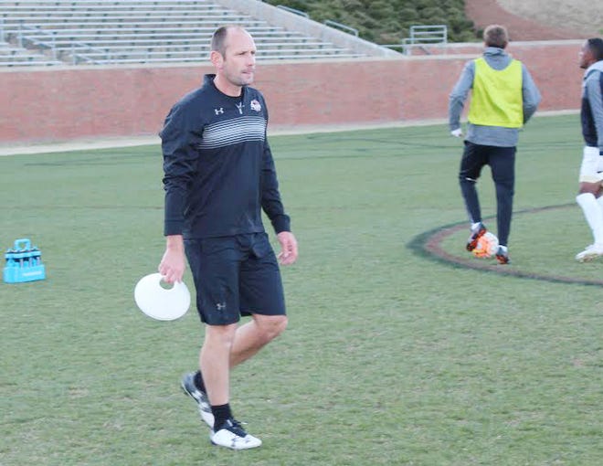 Marc Reeves will coach his first official game with the Elon men's soccer team in a few months.