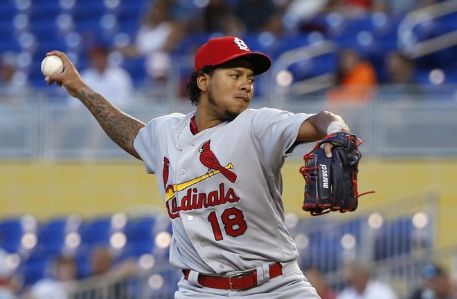 Cardinals' Carlos Martinez delivers a pitch during the first inning against Miami on Monday. [Wilfredo Lee/The Associated Press]