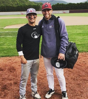 Greencastle-Antrim graduates Hunter Szaflarski (left) and Jared Grove pose for a photo after a recent college baseball game between Lock Haven and Indiana University of Pennsylvania. Szaflarski, who plays for Lock Haven, and Grove, a coach for IUP, will be in opposite dugouts when the Pennsylvania State Athletic Conference baseball tournament begins on Wednesday.