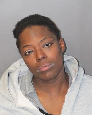 Chaquita McKoy, 30, of Brockton, in a booking photo from her arrest in March 2017.
