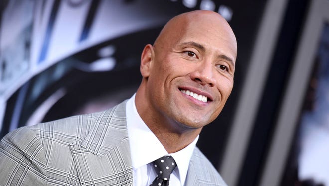In this May 26, 2015, file photo, Dwayne Johnson arrives at the premiere of “San Andreas” at the TCL Chinese Theatre in Los Angeles. (Associated Press)