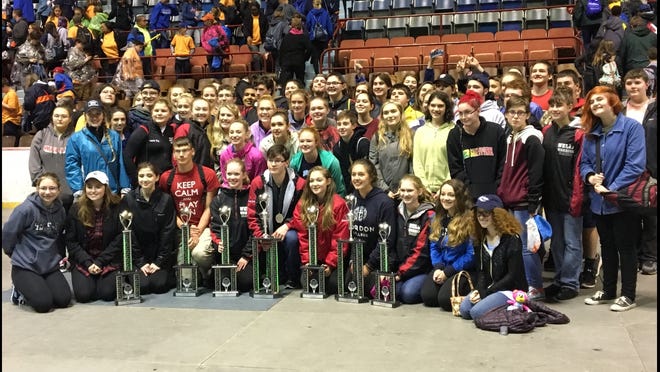 Wells High School musicians with their trophies in the competition space in Hershey, Pennsylvania. 

[Courtesy photo]
