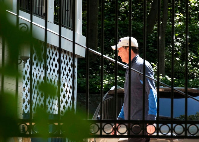 Former FBI Director James Comey walks at his home in McLean, Va. on Wednesday. President Donald Trump fired Comey on Tuesday, ousting the nation’s top law enforcement official in the midst of an investigation into whether Trump’s campaign had ties to Russia’s election meddling. (AP Photo/Sait Serkan Gurbuz)