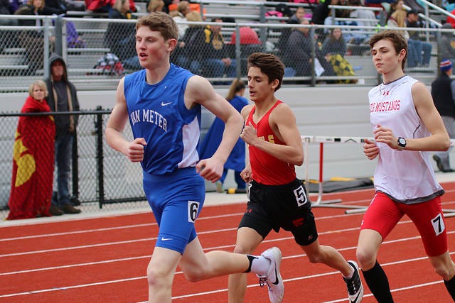 Jack Trudo runs the 3200 meter run in a meet earlier this year. Trudo placed second in the 3200 at the Hap Merritt Invitational on May 8. PHOTO BY BAILEY FREESTONE/DALLAS COUNTY NEWS