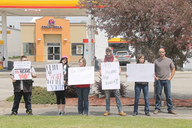 Mercedes Rundquist and five of her friends held a peaceful protest Wednesday afternoon. [COREY MURRAY PHOTO]