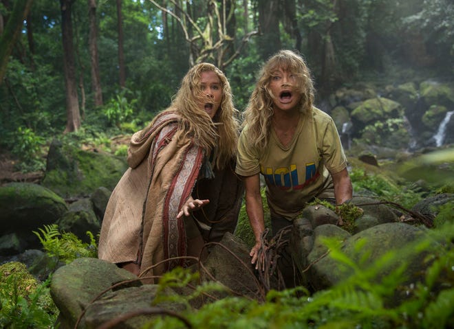 This image shows Goldie Hawn, right, and Amy Schumer in a scene from "Snatched." (Justina Mintz/20th Century Fox)