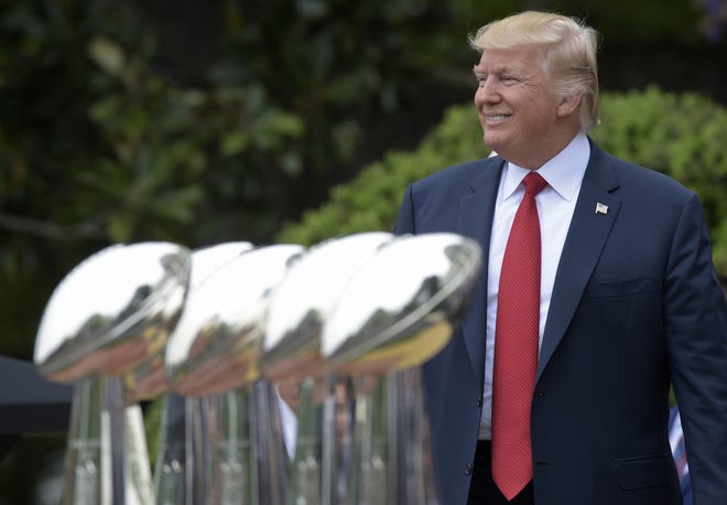 In this April 19, 2017, file photo, President Donald Trump arrives to speak on the South Lawn of the White House in Washington during a ceremony where he honored the Super Bowl Champion New England Patriots. Newsday reported May 10, 2017, that the lacrosse team for Adelphi University in Garden City, New York, takes the field to a speech by President Donald Trump. THE ASSOCIATED PRESS