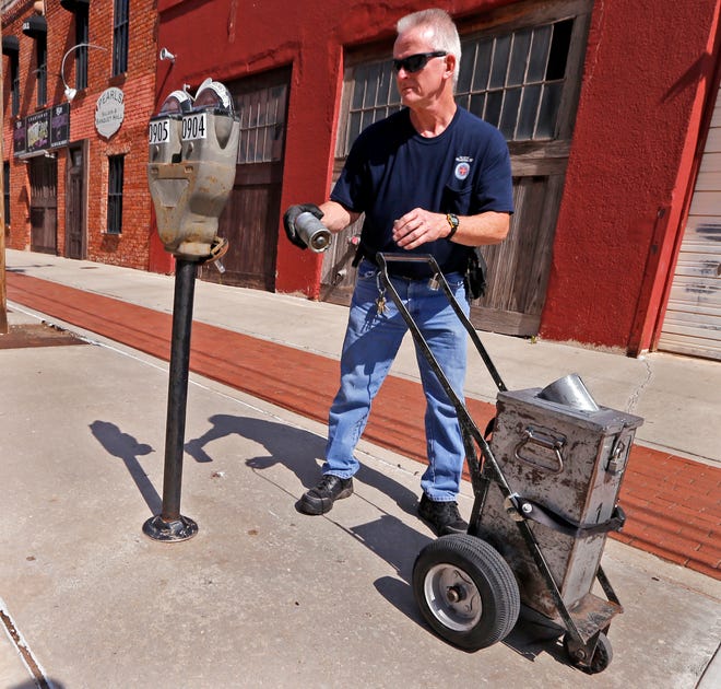 Gestaag Habitat stil OKC, first to use mechanical parking meters, taking down the last ones