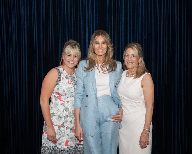 North Hampton jeweler Vicki Halsor (right) and her daughter Abbey Marceau (left) were VIPs at the First Lady's Luncheon May 4 for the bracelets they made for the event, even getting a picture with the first lady herself, Melania Trump (center). [Courtesy photo]