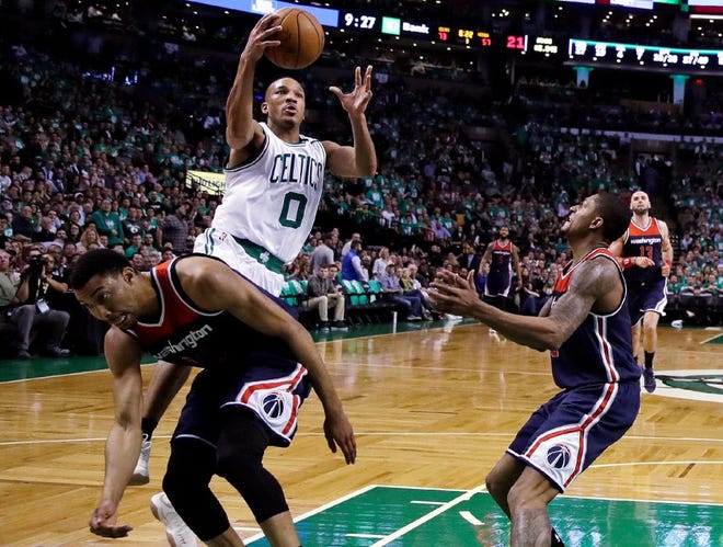 Boston's Avery Bradley drives to the basket against the Wizards during the second half of of Game Five Wednesday night in Boston.