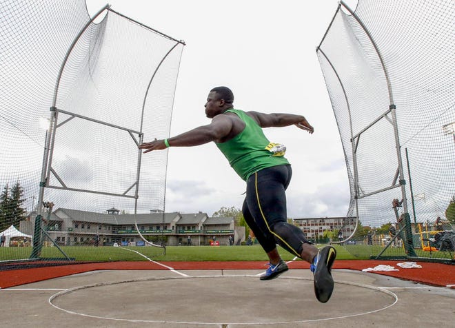Oregon's Ryan Hunter competes in the discus at Hayward Field during the Oregon Twilight track and field meet in Eugene, OR, on Friday, May 5, 2017. (Collin Andrew/The Register-Guard)
