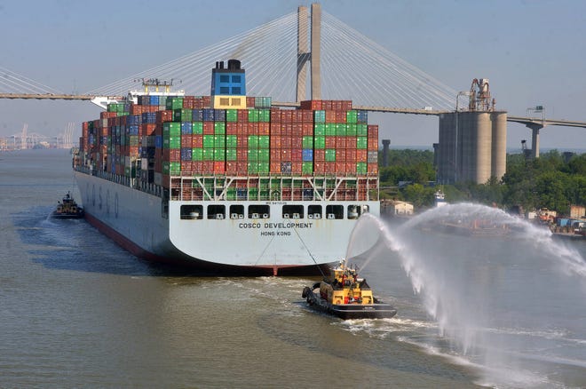 The COSCO Development, the largest container ship ever to call on the U.S. East Coast, sails down the Savannah River to the Georgia Ports Authority’s container port in Garden City. (Steve Bisson/Savannah Morning News)