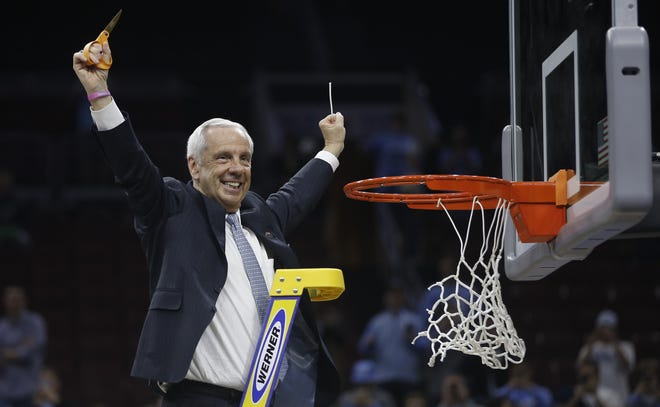 Barely a week after cutting down the nets at the regional finals, North Carolina head coach Roy Williams and the Tar Heels took the NCAA championship game over Gonzaga. [AP Photo/Matt Rourke]