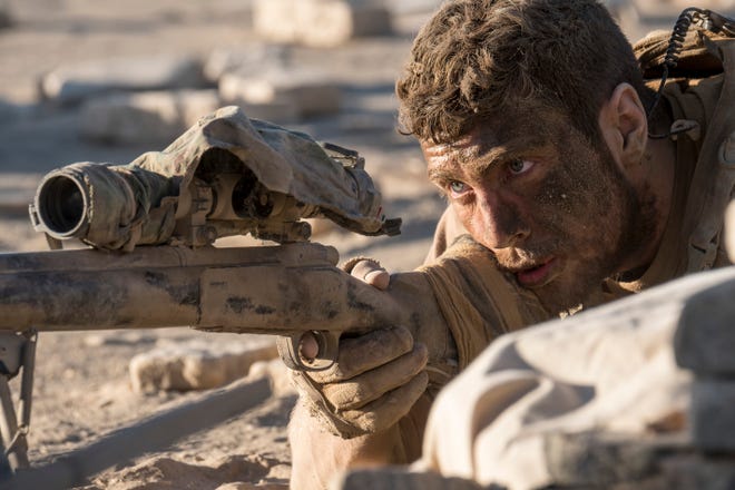 Sergeant Isaac (Aaron Taylor-Johnson) tries to keep his wits about him while under fire. (Photo by David James)