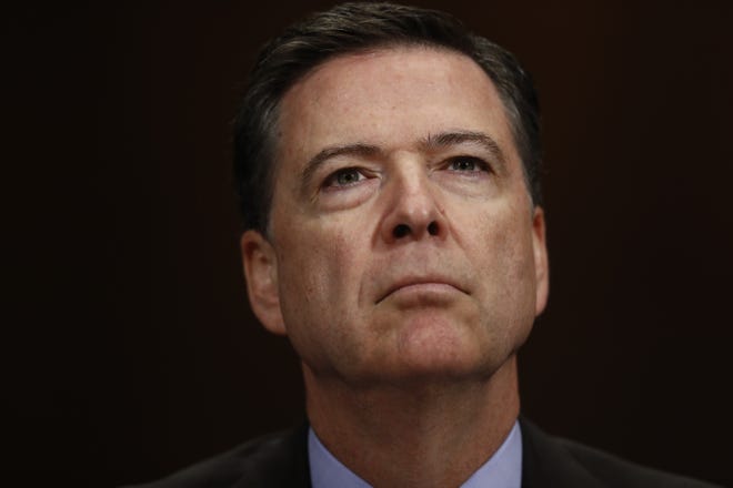 In this May 3, 2017, file photo, then-FBI Director James Comey listens on Capitol Hill in Washington. Comey has declined to appear before the Senate Intelligence Committee. THE ASSOCIATED PRESS