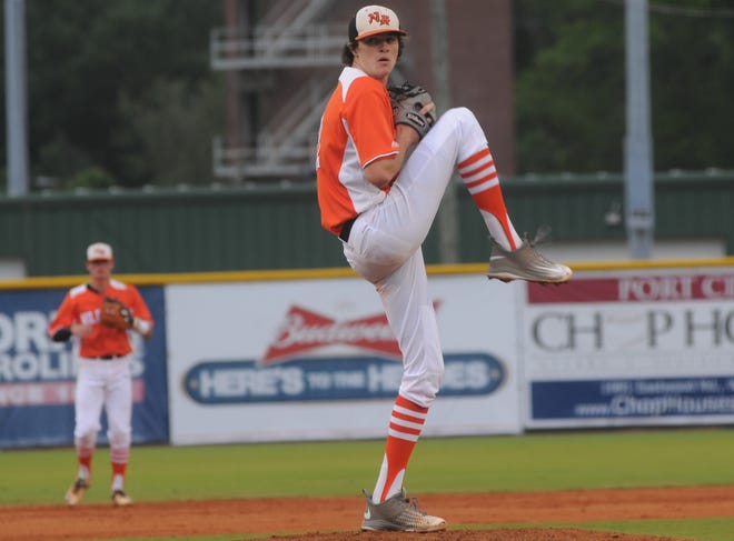 Sophomore pitcher Blake Walston threw a complete-game, one-hitter to lead New Hanover to a 3-0 victory over Middle Creek in the second round of the NCHSAA 4A baseball playoffs Friday night at Buck Hardee Field. [Tim Hower/StarNews]