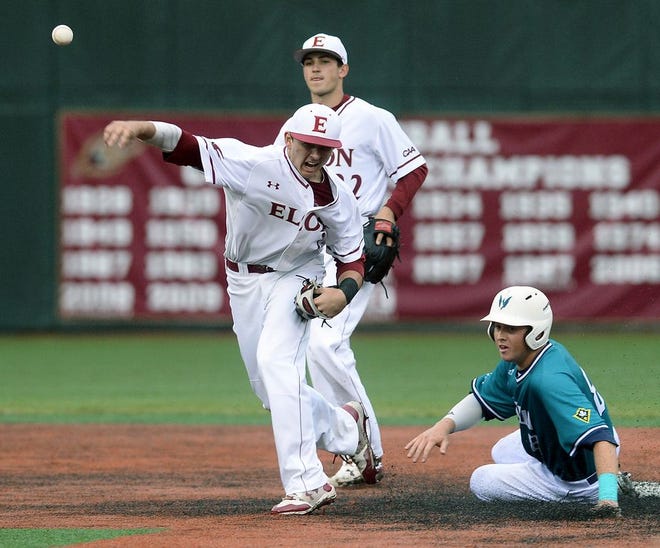 Elon's Joe Satterfield throws to first for a double play as UNC Wilmington's Cole Weiss is out at second and Elon's Ryne Ogren assists in the play at Latham Park.