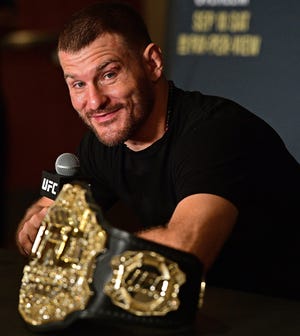 Stipe Miocic will meet Junior Dos Santos in a UFC heavyweight title bout on Saturday in Dallas. Dos Santos won their previous meeting by unanimous decision. [DAVID DERMER/THE ASSOCIATED PRESS]