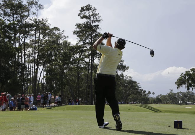 J.B. Holmes hits from the ninth tee during the third round of The Players Championship golf tournament Saturday, May 13, 2017, in Ponte Vedra Beach, Fla. (AP Photo/Lynne Sladky)
