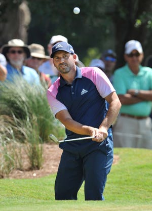 Sergio Garcia chips to the green on hole 3 during Friday action at The Players Championship at the Stadium Course at TPC Sawgrass in Ponte Vedra Beach, Florida. (Bob Self/The Times-Union)