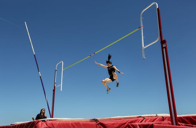 Columbia Independent School's Khristen Bryant clears 10 feet in the pole vault at the Class 1 District 2 meet on May 6 in La Plata. Bryant eventually won the event by clearing 11-6. [TIMOTHY TAI PHOTOS/TRIBUNE]
