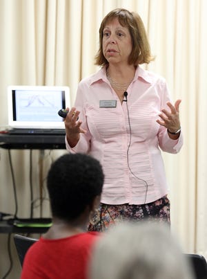 A Literacy Builds Gaston program was held Friday morning at the Gaston County Public Library on East Garrison Blvd. sponsored by the Partnership for Children of Lincoln and Gaston Counties and Gaston County Early Literacy Collaborative. Here, Lisa Finaldi with the NC Early Childhood Foundation speaks about literacy in the state. [Mike Hensdill/The Gaston Gazette]