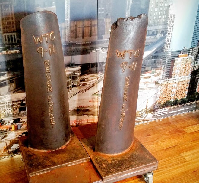 One feature within the 9/11 Never Forget Exhibit is these pieces of steel taken from Ground Zero, which have been positioned to look like the Twin Towers did before they were destroyed on Sept. 11, 2001. [Special to The Gazette]