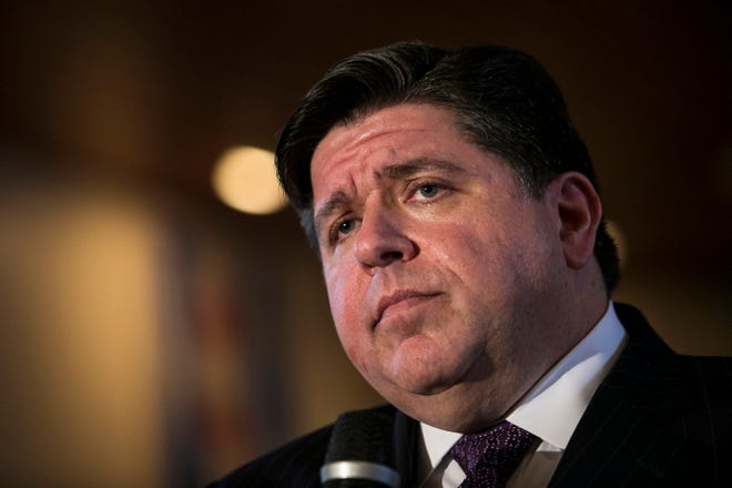 In this March 27, 2017 photo, Illinois Democratic gubernatorial candidate J.B. Pritzker speaks in Chicago. Pritzker has received a nearly $230,000 reduction in property taxes for a Chicago mansion the billionaire bought next to his multimillion-dollar home. The Chicago Sun-Times reported Pritzker let the home fall into disrepair then appealed his property tax assessment, saying the home is "uninhabitable." The Cook County assessor slashed the home's value from $6.25 million to about $1.1 million, reducing his taxes 83 percent. (Ashlee Rezin/Sun Times via AP)