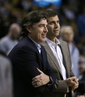 Co-owner Wyc Grousbeck (left), coach Brad Stevens, and the Celtics have a 25 percent chance of winning the NBA's draft lottery on Tuesday night.