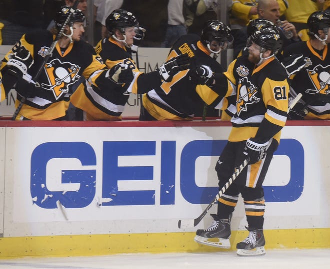 Penguins' Phil Kessel skates along the bench after scoring a goal during the third period of the Penguins 1-0 win over the Ottawa Senators in Game 2 of the Eastern Conference Finals on Monday at PPG Paints Arena in Pittsburgh.