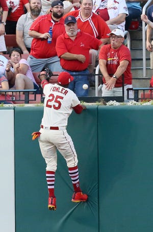 St. Louis Cardinals center fielder Dexter Fowler is unable to catch a solo home run by Boston Red Sox's Jackie Bradley Jr. during the second inning of a baseball game Tuesday, May 16, 2017, at Busch Stadium in St. Louis. (Chris Lee/St. Louis Post-Dispatch via AP)