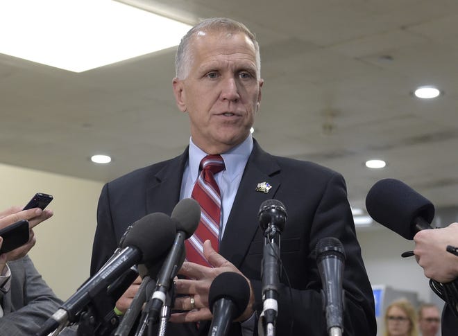 In this April 7, 2017 file photo, Sen. Thom Tillis, R-N.C., speaks to reporters on Capitol Hill in Washington. Tillis collapsed Wednesday, May 17, 2017, during a Washington race and was taken away in ambulance.