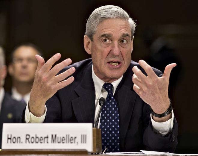 In this June 19, 2013, file photo, former FBI Director Robert Mueller testifies on Capitol Hill in Washington. On May 17, 2017, the Justice Department said is appointing Mueller as special counsel to oversee investigation into Russian interference in the 2016 presidential election. THE ASSOCIATED PRESS