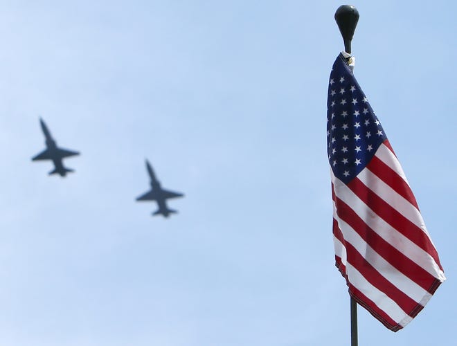 Jets from the 325th Fighter Wing, Tyndall Air Force Base perform a flyover during the 2016 Memorial Day observance at Kent-Forest Lawn Cemetery in Panama City. This year's Memorial Day observance begins at 10 a.m. May 29 at Kent-Forest Lawn Cemetery.[ANDREW WARDLOW/NEWS HERALD FILE PHOTO]
