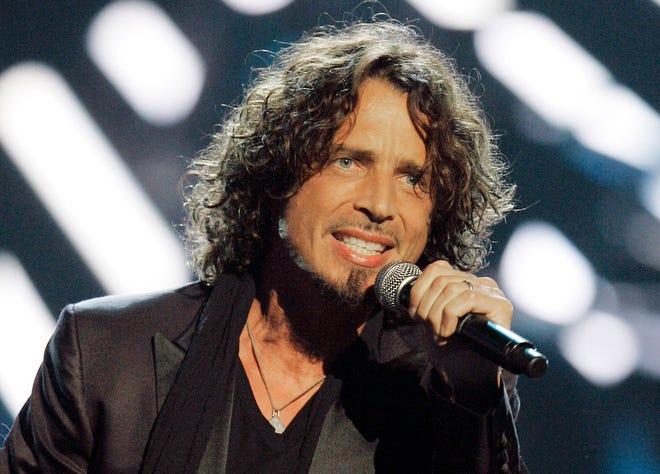 FILE - In this Sept. 5, 2008, file photo, musician Chris Cornell performs on stage during Conde Nast’s Fashion Rocks show in New York. According to his representative, rocker Chris Cornell, who gained fame as the lead singer of Soundgarden and later Audioslave, has died Wednesday night in Detroit at age 52. (AP Photo/Jeff Christensen, File)