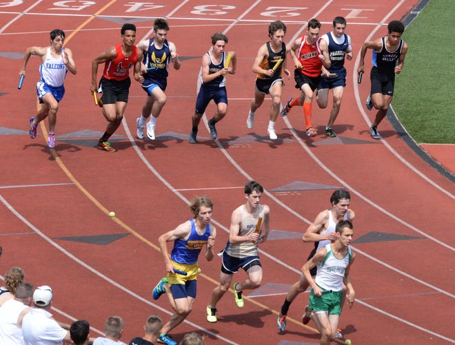 Teams in the boys 1,600-meter relay run during the WPIAL track championships at Baldwin High School on Thursday.