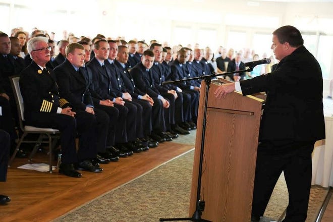 Mayor Thomas Koch addresses the 26 new additions to the Quincy Fire Department during the graduation ceremony held on Thursday, May 18, 2017, in the Tirrell Room.