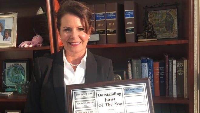 Palm Beach County Judge Lisa Small recently was awarded the Outstanding Jurist of the Year Award by the local chapter of the American Inns of Court. Courtesy Michael Small