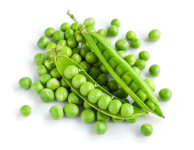 Fresh young peas can shine in hummus, cupcakes or even cocktails. [Thinkstock photo]