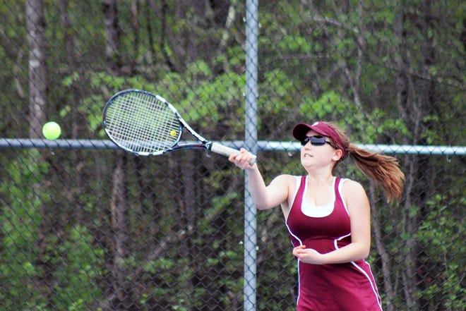 Portsmouth's Hanna Street hits a forehand shot during Division II action Thursday against Oyster River in Durham. The Clippers won 9-0 and capped a 14-0 regular season.