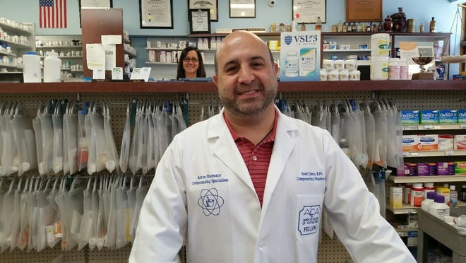 Saad Dinno owns three independent local pharmacies with his brother, Raied: West Concord Pharmacy on Main Street in Concord, Acton Pharmacy on Massachusetts Avenue in Acton and Keyes Drug in Newton. Saad is pictured in his Acton location. Pharmcist Lynn Hearne is in the background. [Wikced Local photo/Henry Schwan]