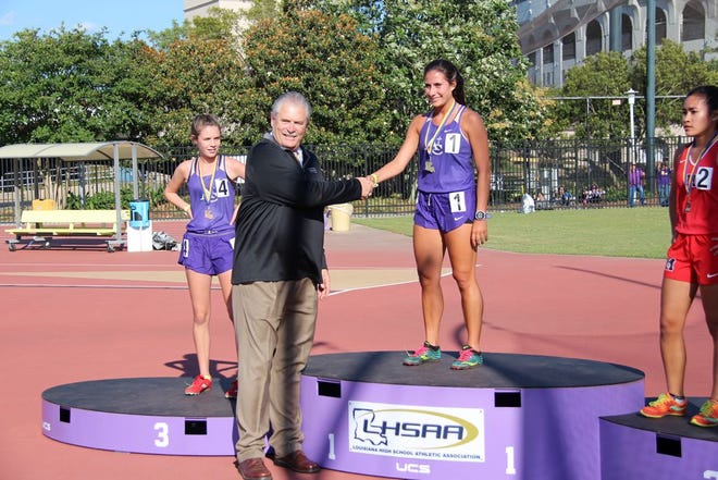 Sophie Daigle won the 800, 1,600 and 3,200 events in Ascension Catholic's state title run. Photo by Kyle Riviere.