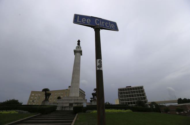 In this Sept. 2, 2015, file photo, the statue of Gen. Robert E. Lee stands in Lee Circle in New Orleans. The city of New Orleans plans to take down the confederate statue on Friday, May 19, 2017, completing the southern cityþÄôs removal of four Confederate-related statues that some called divisive. THE ASSOCIATED PRESS