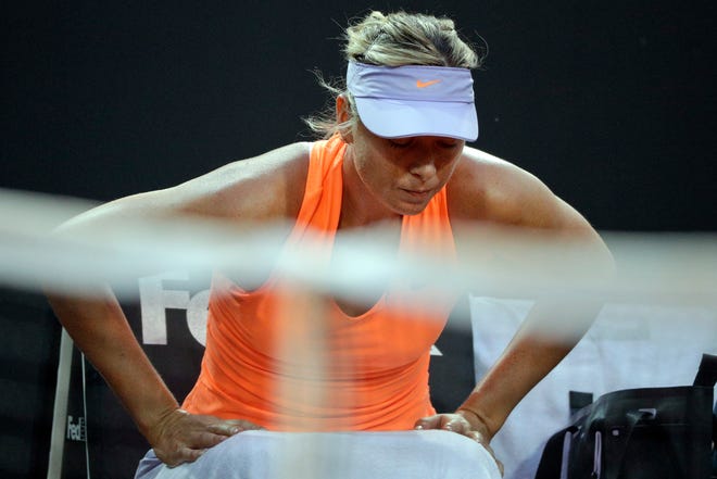 Maria Sharapova of Russia relaxes during a pause of her match against Mirjana Lucic-Baroni of Croatia at the Italian Open tennis tournament, in Rome, Tuesday, May 16, 2017. (AP Photo/Andrew Medichini)